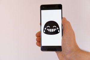 sad face app on smart phone