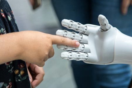 Robot touching human hand
